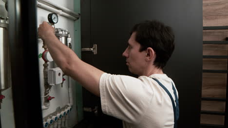 plumber tightening a nut