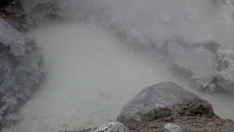 close-up of boiling water in primordial or prehistoric looking geothermal feature