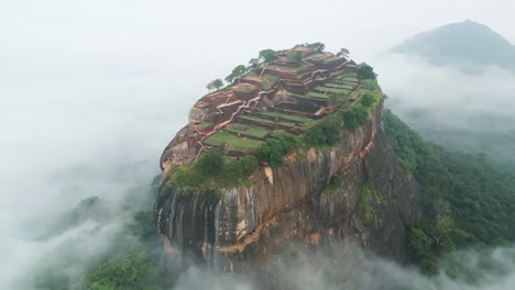 aerial drone shot of world wonder, sigiriya rock in sri lanka