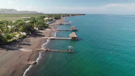 aerial over palmar de ocoa luxurious houses and beach, azua, dominican