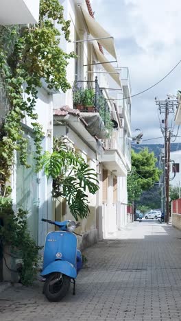 charming mediterranean alleyway with blue scooter