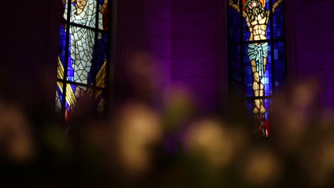 ornate drawings of christ on the church wall - camera tilt up