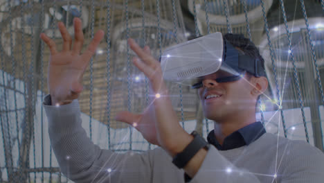 animation of network of connections over biracial man using vr headset