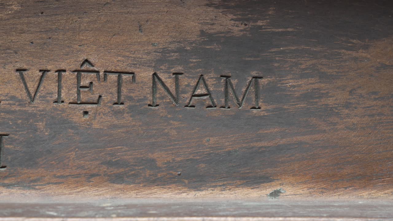 Vietnam inscription copper statue landmark base Thang Long imperial citadel
