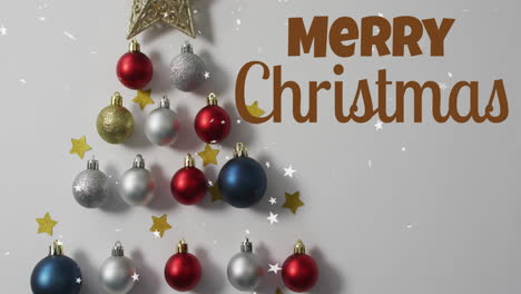 animación del texto de feliz navidad sobre bolas