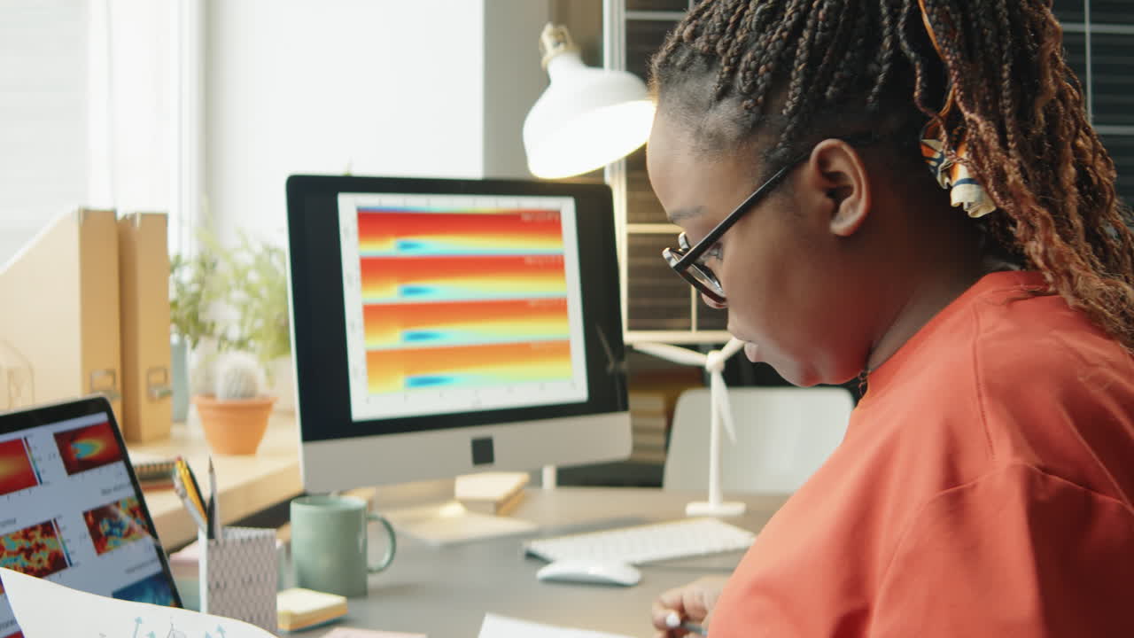 African American Woman Working on Sustainable Energy Project