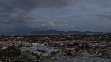 Aerial-shot-of-a-town-at-sunset