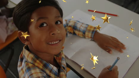 young boy drawing in notebook with golden star animation overlay