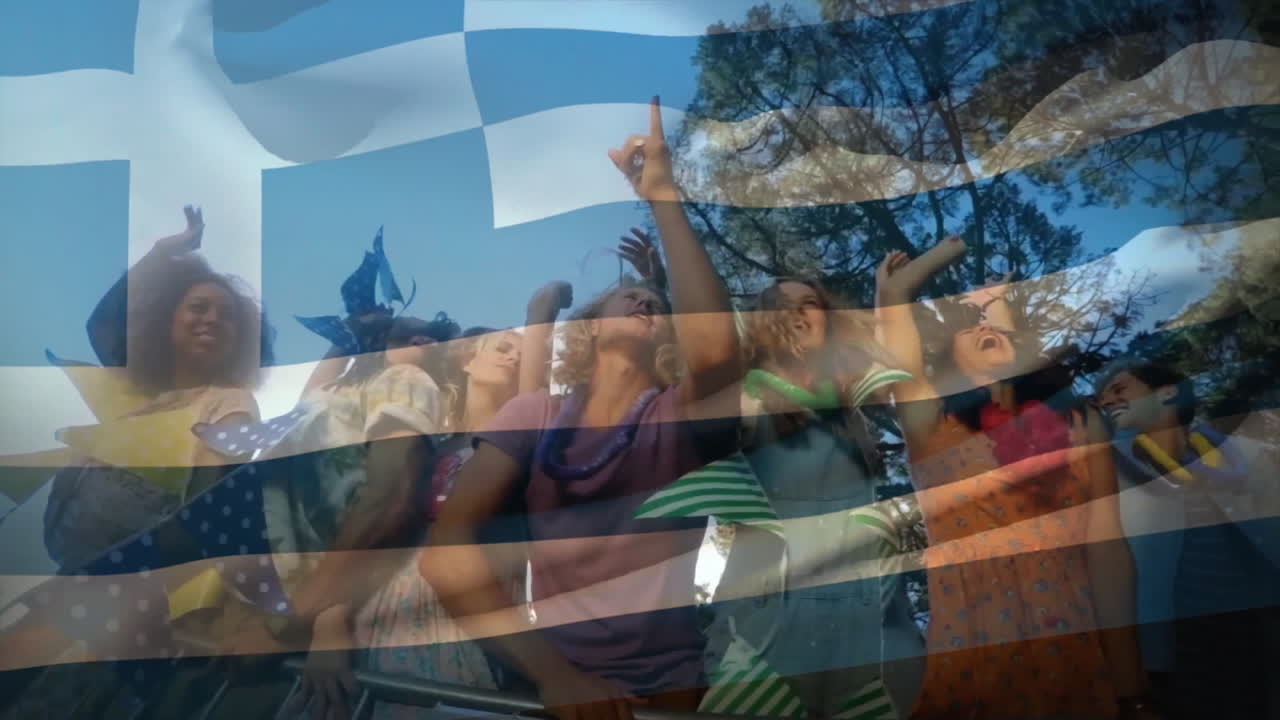 Animation of flag of greece waving over white and multiracial male and female friends dancing