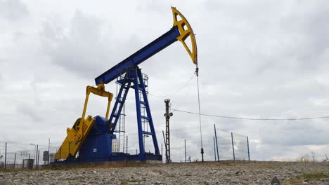 oil pumpjack pumping sequentially oil from the ground near ploiesti, romania