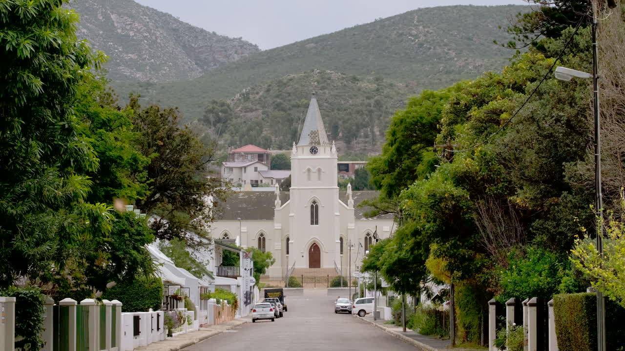Telephoto view down road of imposing dutch reformed church in Montagu
