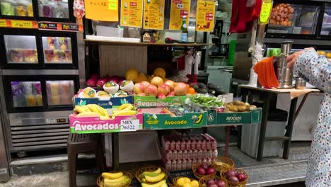 a bustling fruit stall in a vibrant market