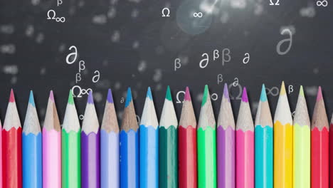 animation of mathematical symbols and pencils on black background
