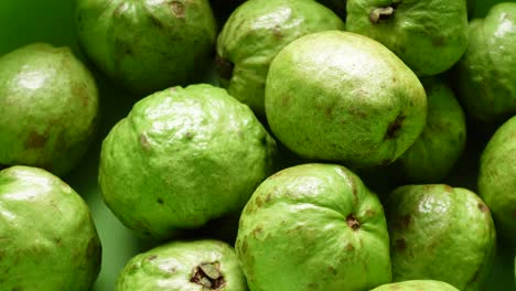 pile of green guavas