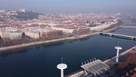 lyon, france panoramic aerial view of busy downtown river cityscape skyline at sunrise