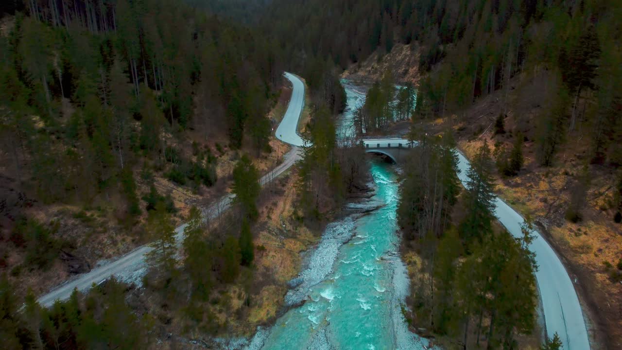 Alps mountain River aerial cinemagraph seamless video loop of a scenic and idyllic canyoning waterfall with fresh natural blue water in the Bavarian Austrian alps, flowing along canyon forest trees. 4K UHD. Rissach Tyrol Austria Engtal Ahornboden