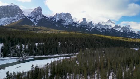 aerial of canadian rockies with bow river and forest, alberta, canada