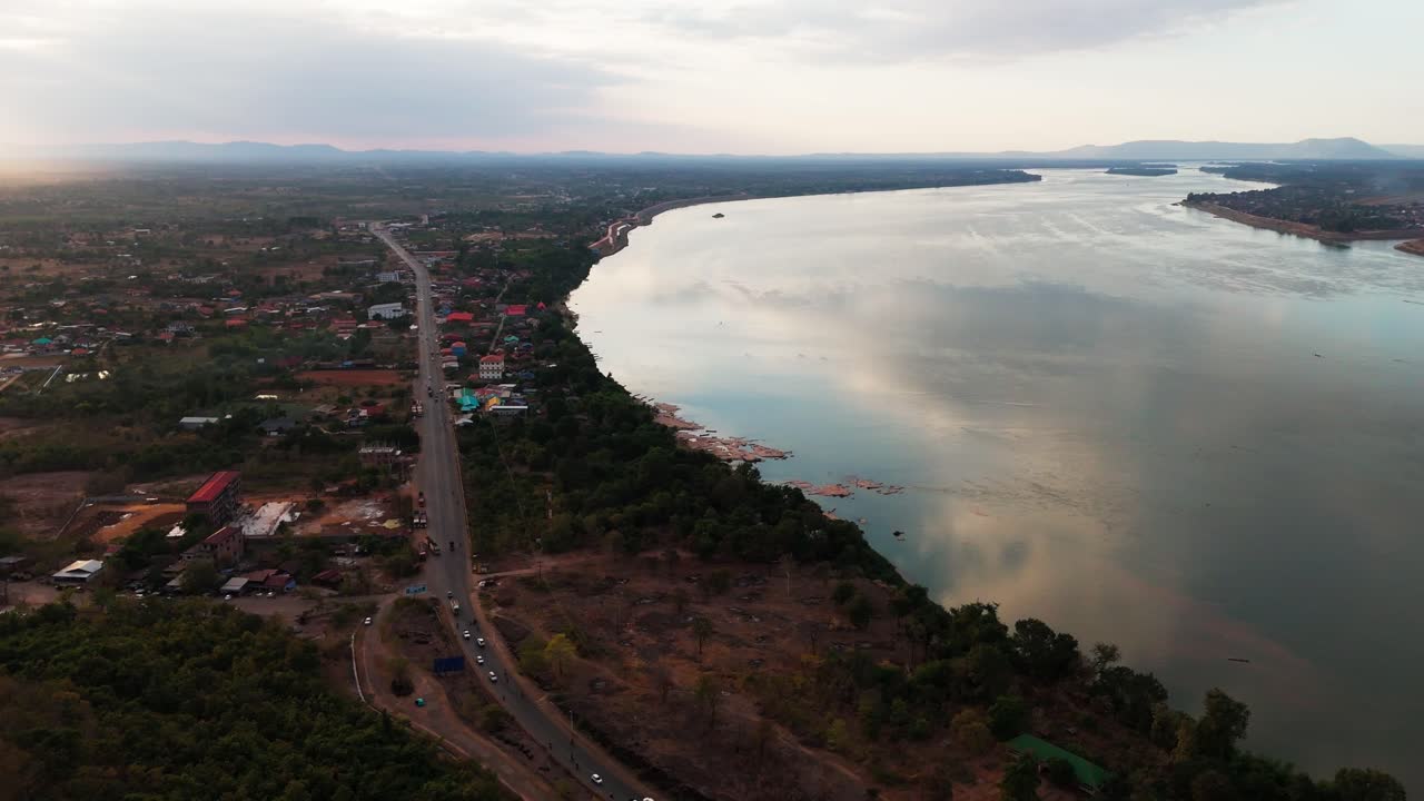 Pakse city Laos aerial view above the Mekong river at sunset