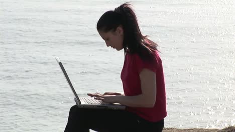 Woman-working-on-Laptop