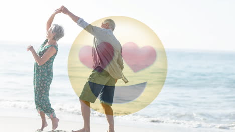 happy retired couple dancing on the beach for saint valentines day