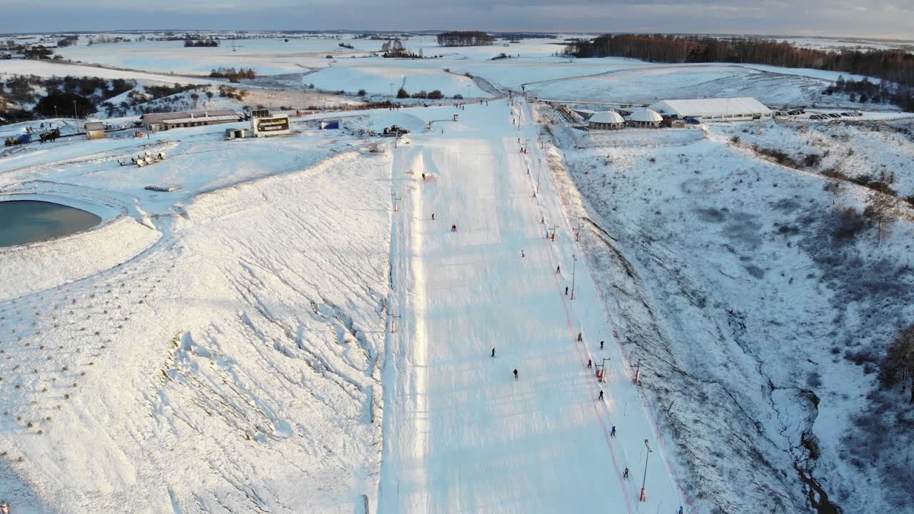 Small ski slope with wintery snowy surroundings