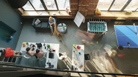 busy coworking space aerial view