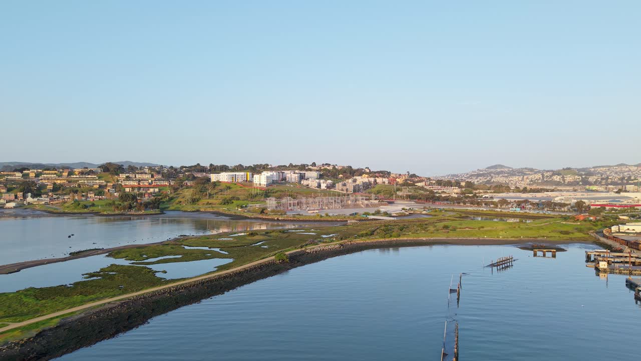 A right to left aerial panning view of Heron's Head Park in San Francisco California. Shot in 4K on a DJI Air 3S.