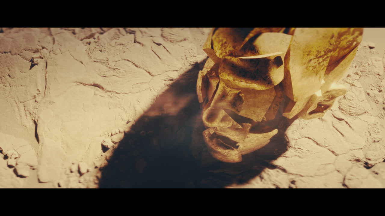 Huge golden statues in the desert during sunset