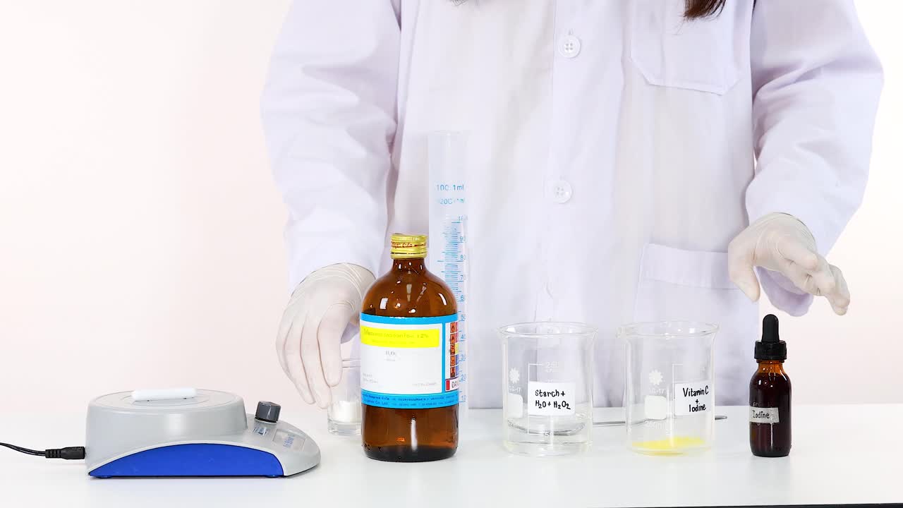 Scientist carefully preparing chemicals for a laboratory science experiment