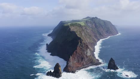 drone footage of dramatic cliffs and rock formations in sao jorge island in the azores, portugal