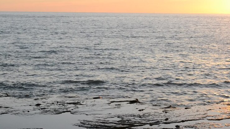Tramonto sull'Oceano Atlantico. Chipiona, la città in Andalusia, Spagna.
