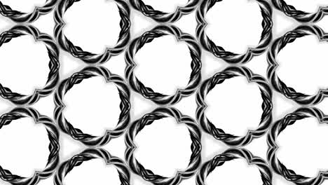 animación en bucle sin costuras de 4k de patrón en blanco y negro con cintas son retorcidas y forman estructuras circulares complejas como patrón de adorno simétrico o caleidoscópico