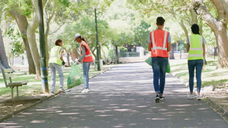 volunteers cleaning litter in a community park