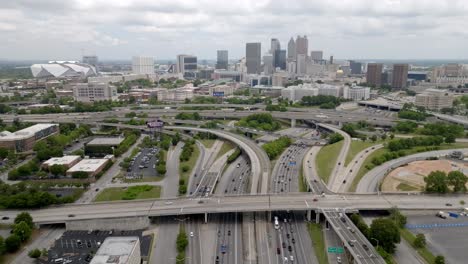 atlanta, georgia skyline, traffic and georgia state capitol building with drone video wide shot moving in