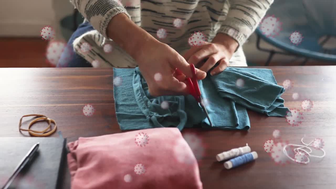 анимация клеток covid-19 над человеком, шиющим маску для лица