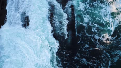 waves hitting the cliff in curtis island lighthouse camden maine usa