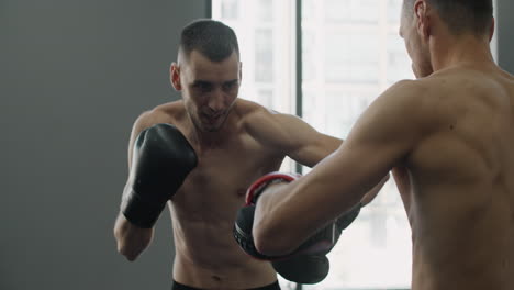 two men boxing training