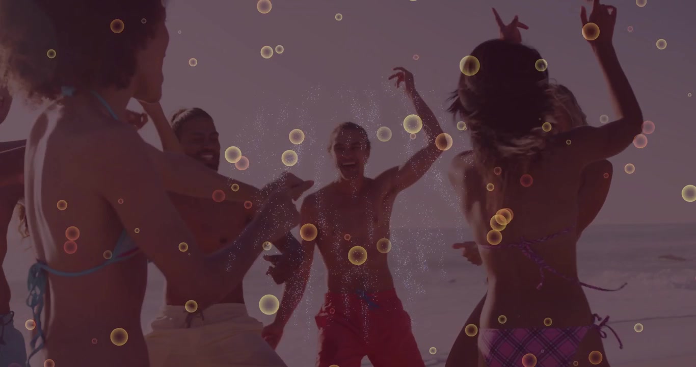 Seven adults playing on sunset shore stepping clapping spraying water burst bubble overlay travel