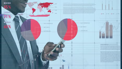 animation of financial data processing over african american businessman using smartphone