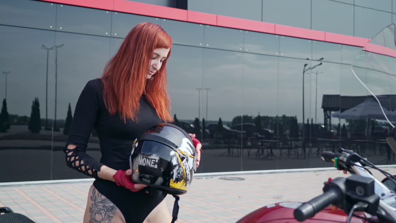 Woman sitting on motorcycle. Biker sexy woman sitting on motorcycle