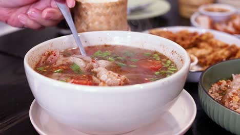 delicious soup being served and enjoyed