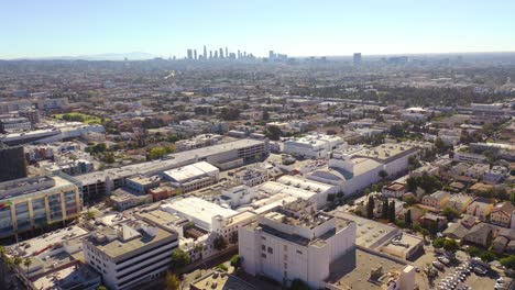 aerial over hollywood area reveals the skyline of los angeles in the distance