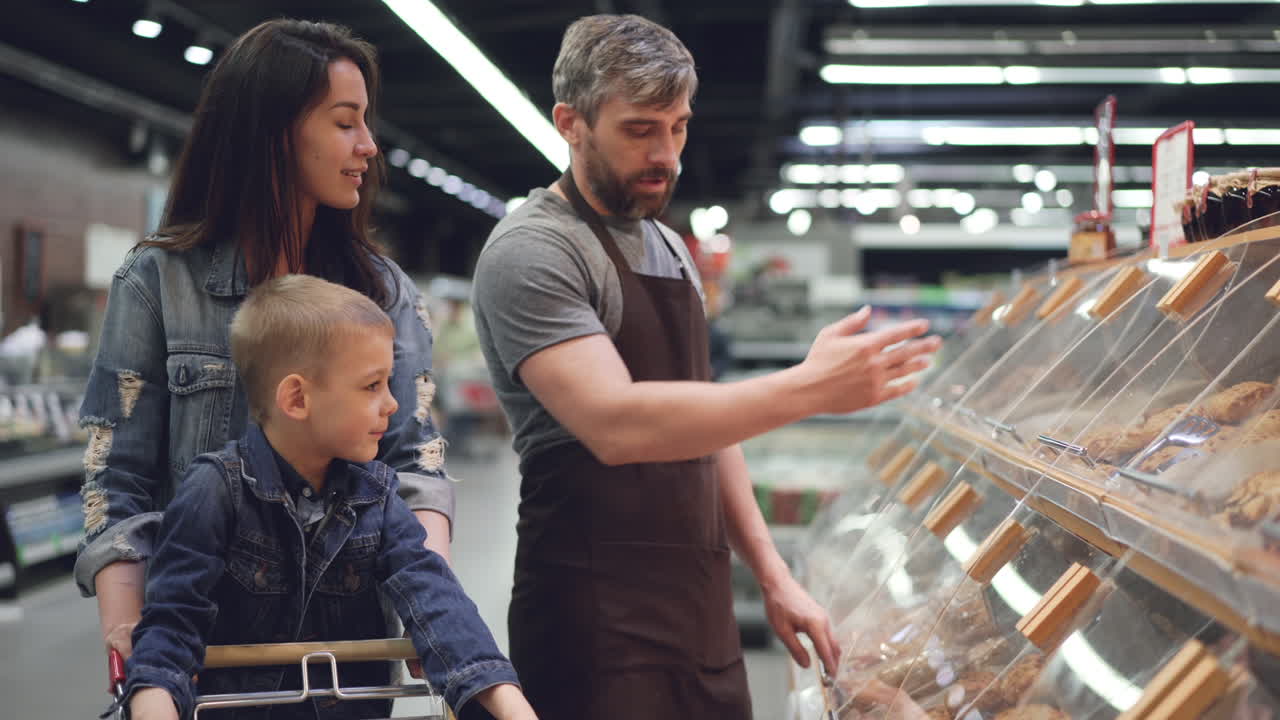 Family Shopping for Bread at the Grocery Store