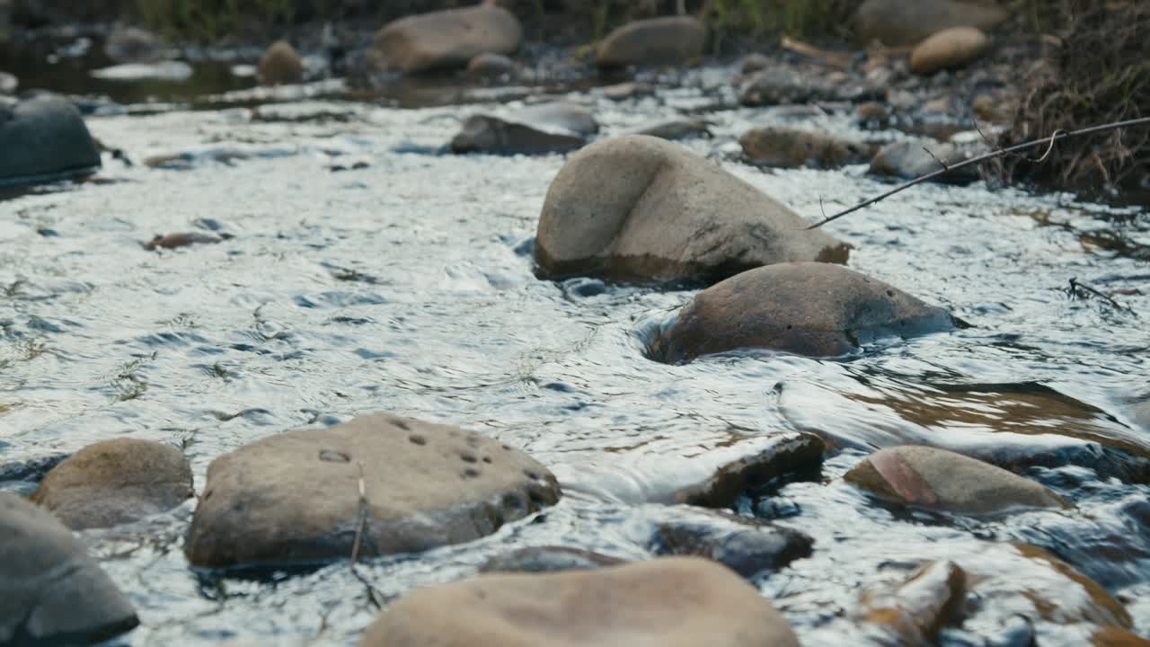 River with fresh water flowing in slow motion in Africa