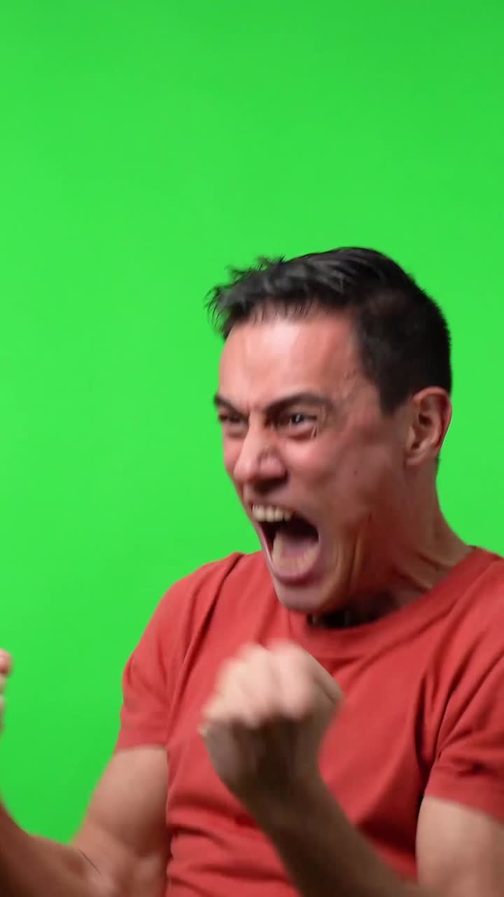 Excited man on green screen