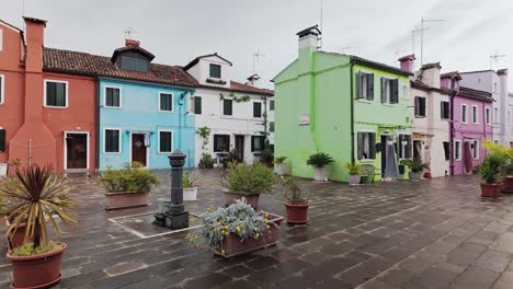 colourful painted residential house facades burano. establishing pan shot
