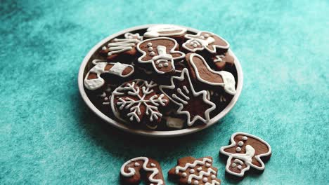 delicious fresh christmas decorated gingerbread cookies placed in wooden crate