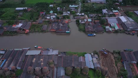 aerial view of brick kilns and canal in vinh long in the mekong delta, vietnam