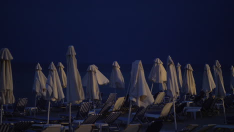 Empty-beach-at-night-and-coming-storm