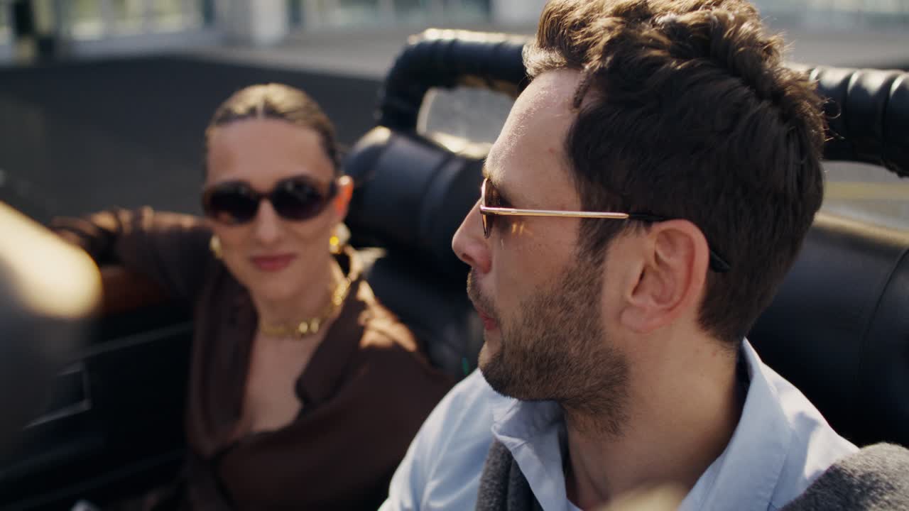 Couple Enjoying a Car Ride